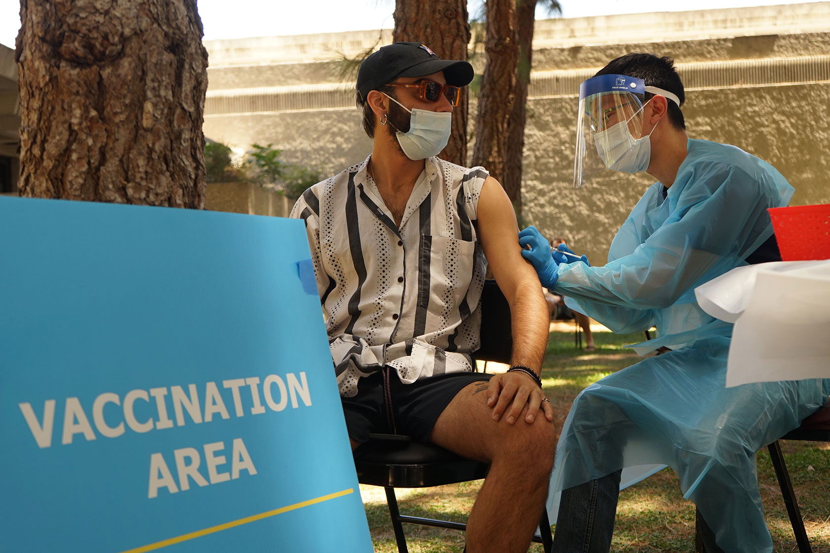 A medical worker administers a dose of the monkeypox vaccine in Los Angeles.