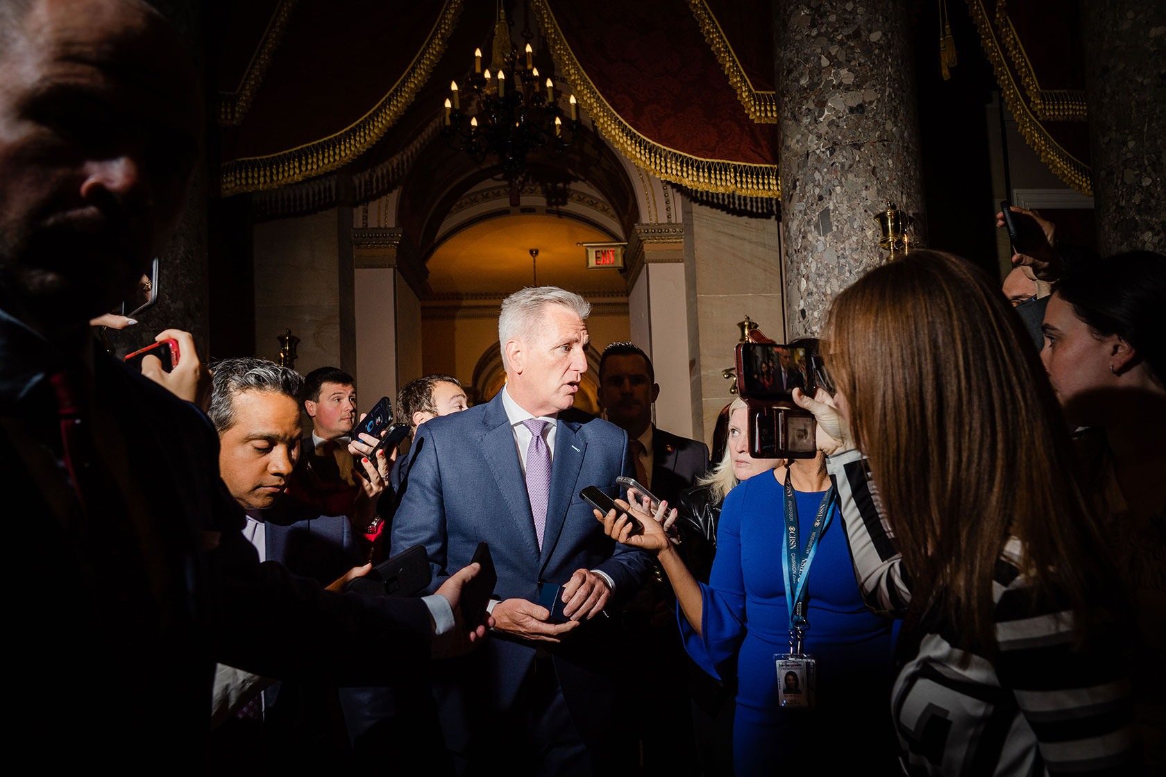 House Speaker Kevin McCarthy (R-CA) is surrounded by reporters after leaving the House floor.