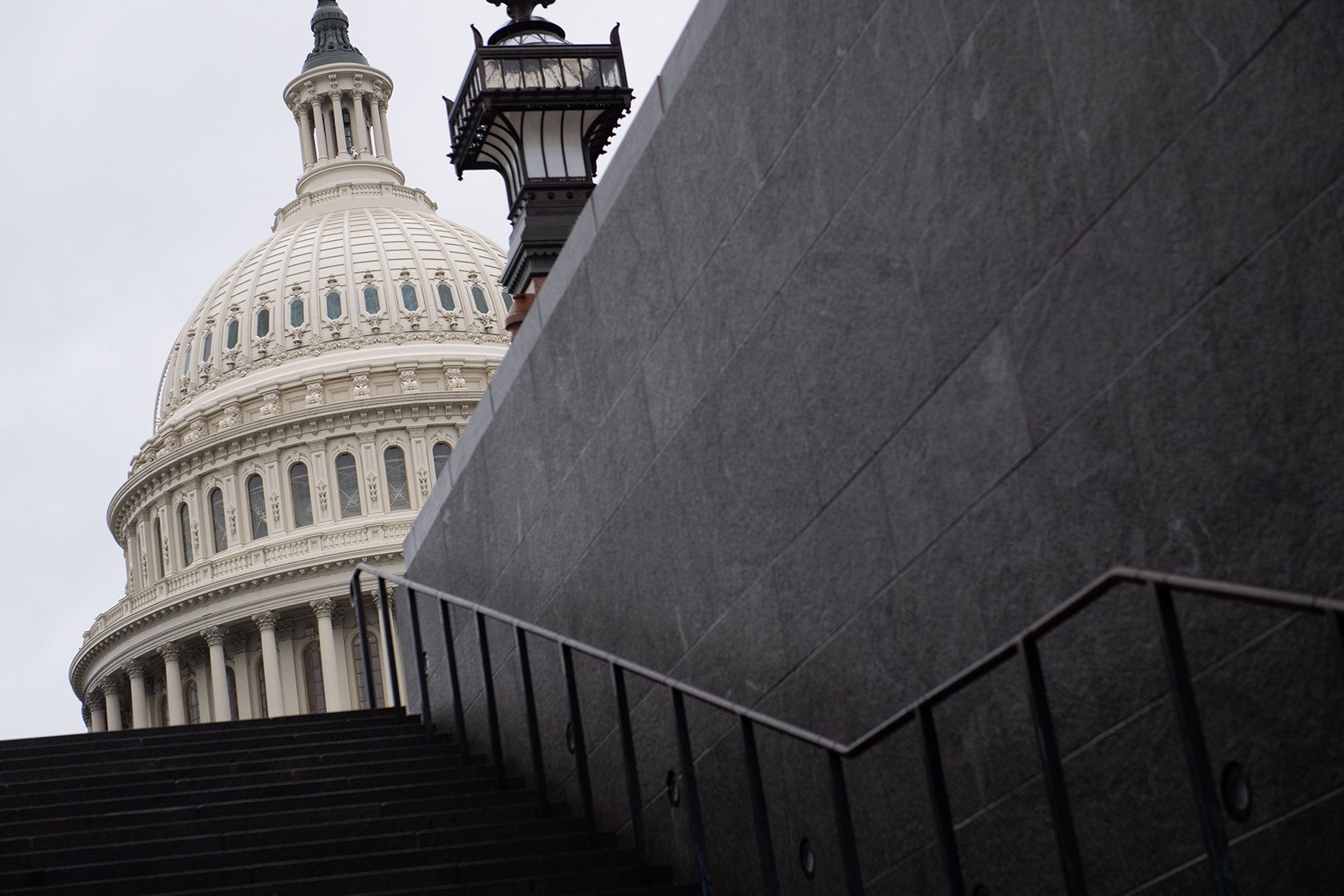 The Capitol building seen at the top of outdoor stairs