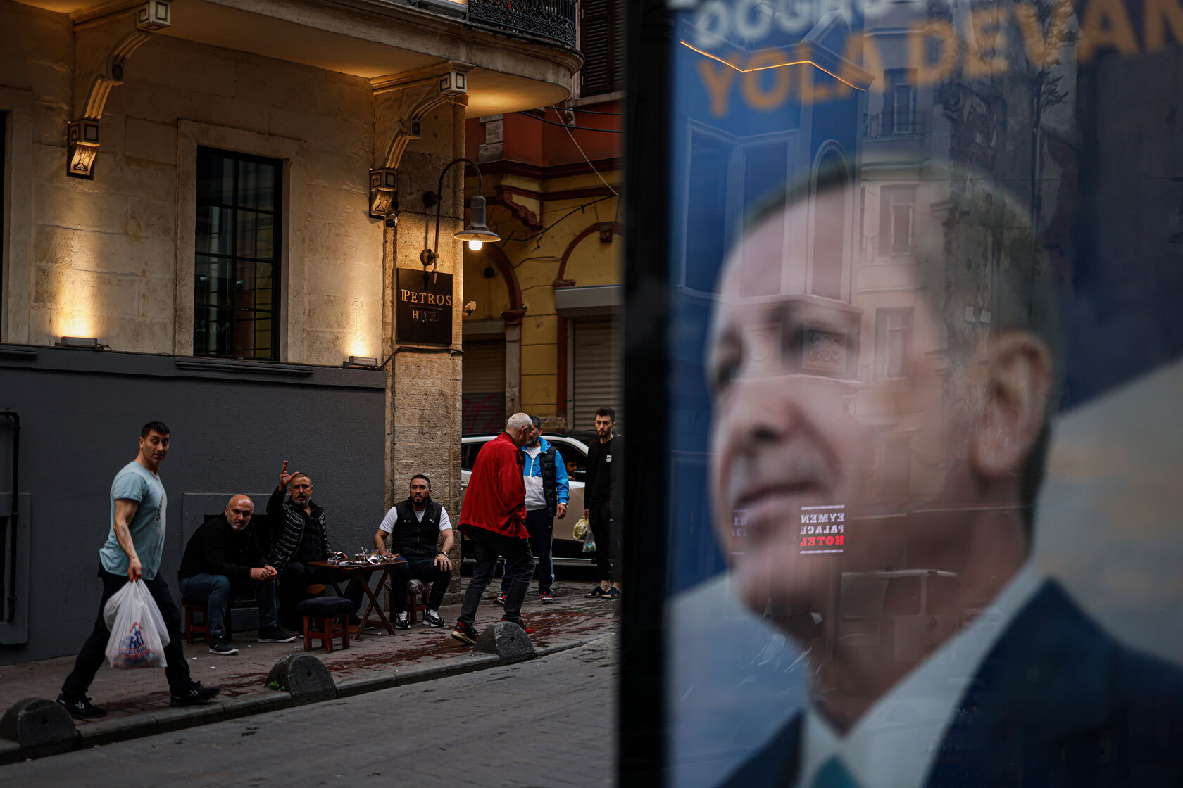 Men drink chai in the street the day after President Recep Tayyip Erdoğan was reelected.