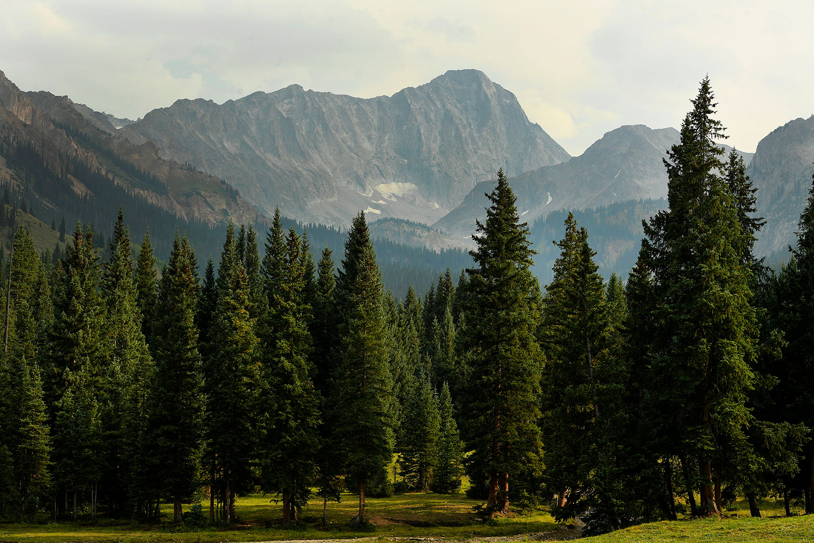 Capitol Peak can be seen in the distance from the Upper Capitol Creek Trail.