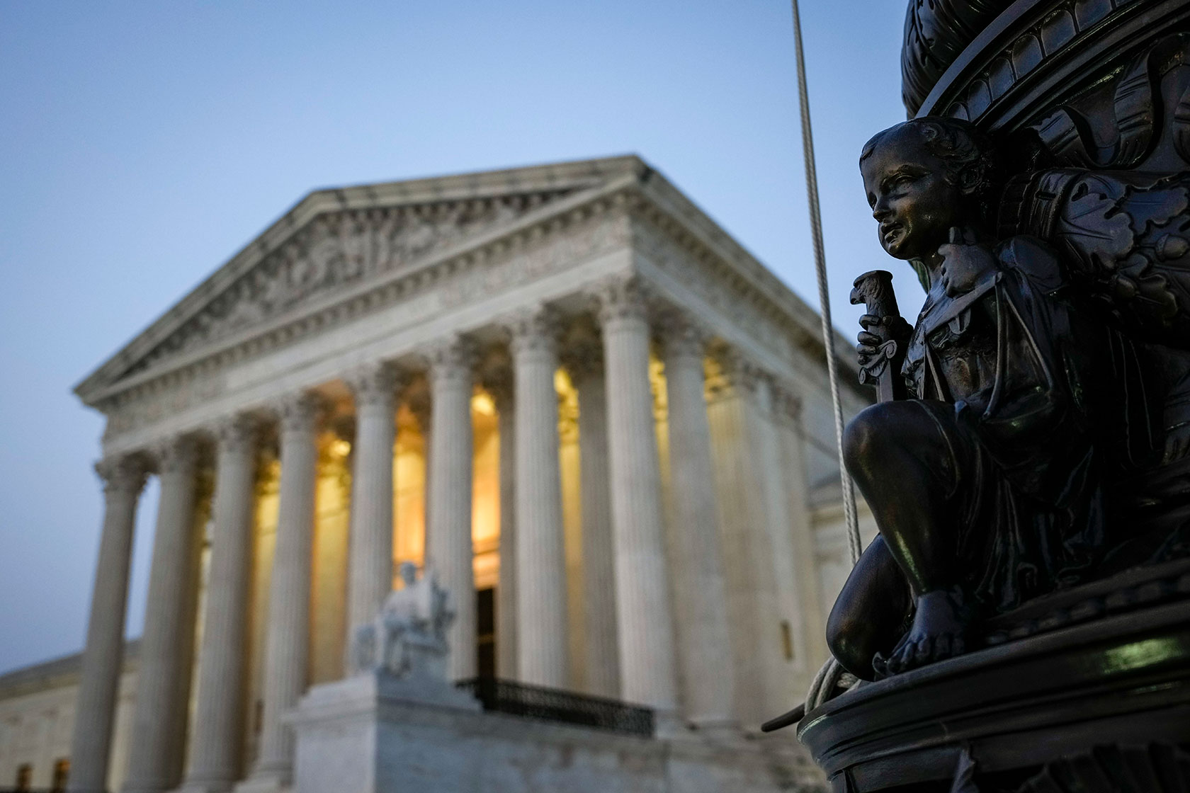 The sun sets on the U.S. Supreme Court building in Washington, D.C.