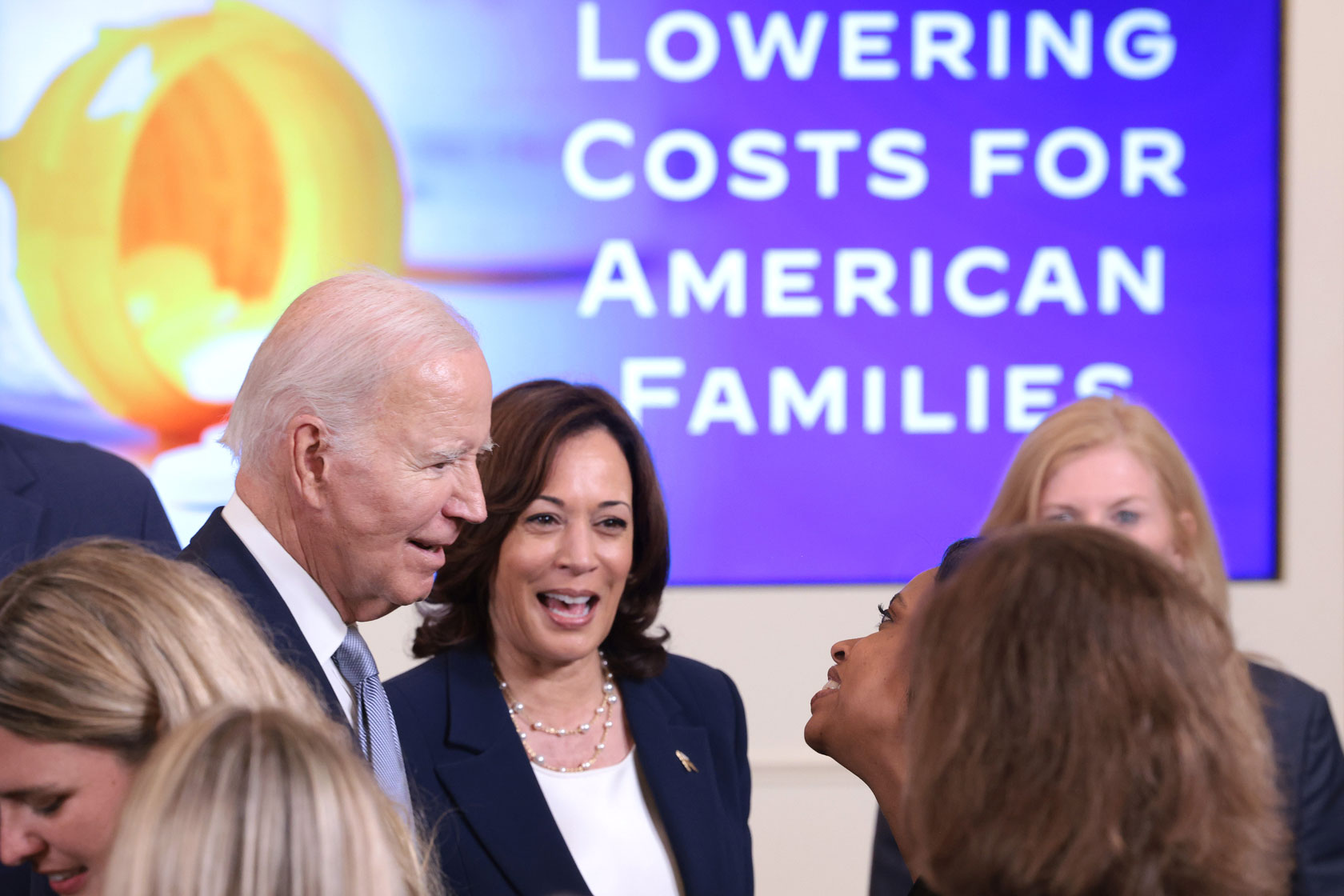 U.S. President Joe Biden and Vice President Kamala Harris greet audience members during an event promoting lower health care costs.