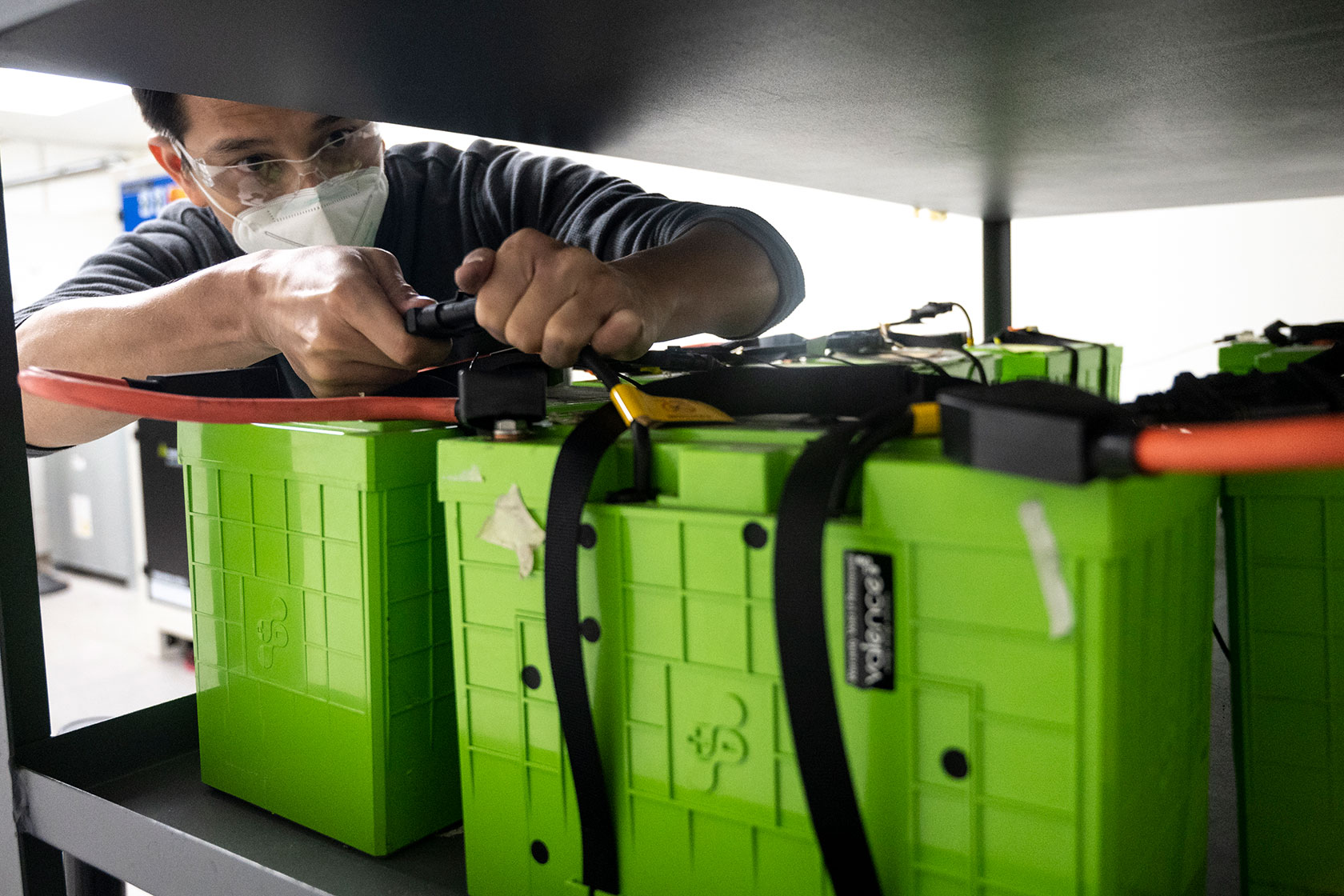 Used electric vehicle batteries are set up for further testing.