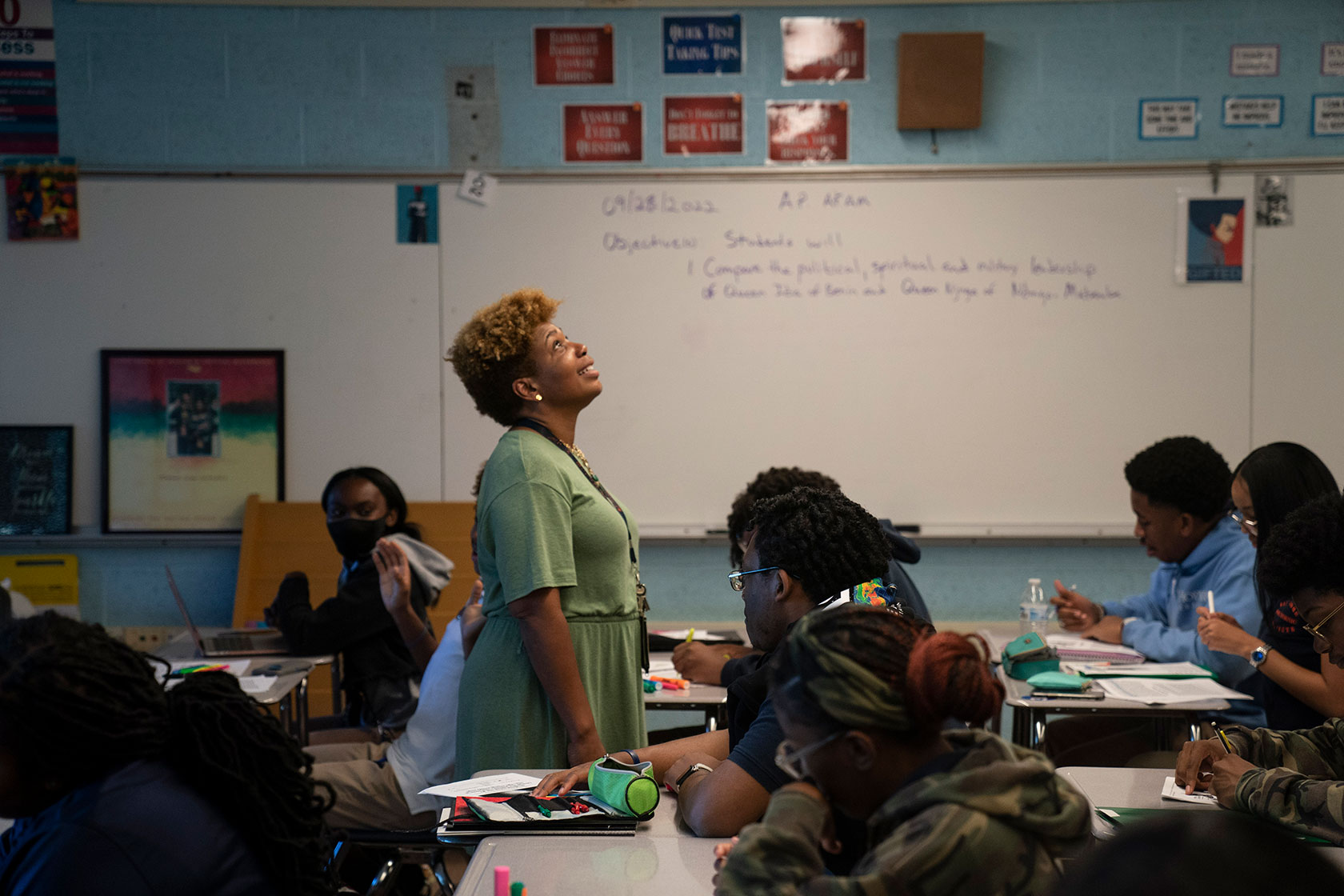 A teacher conducts a lesson for an Advanced Placement course.