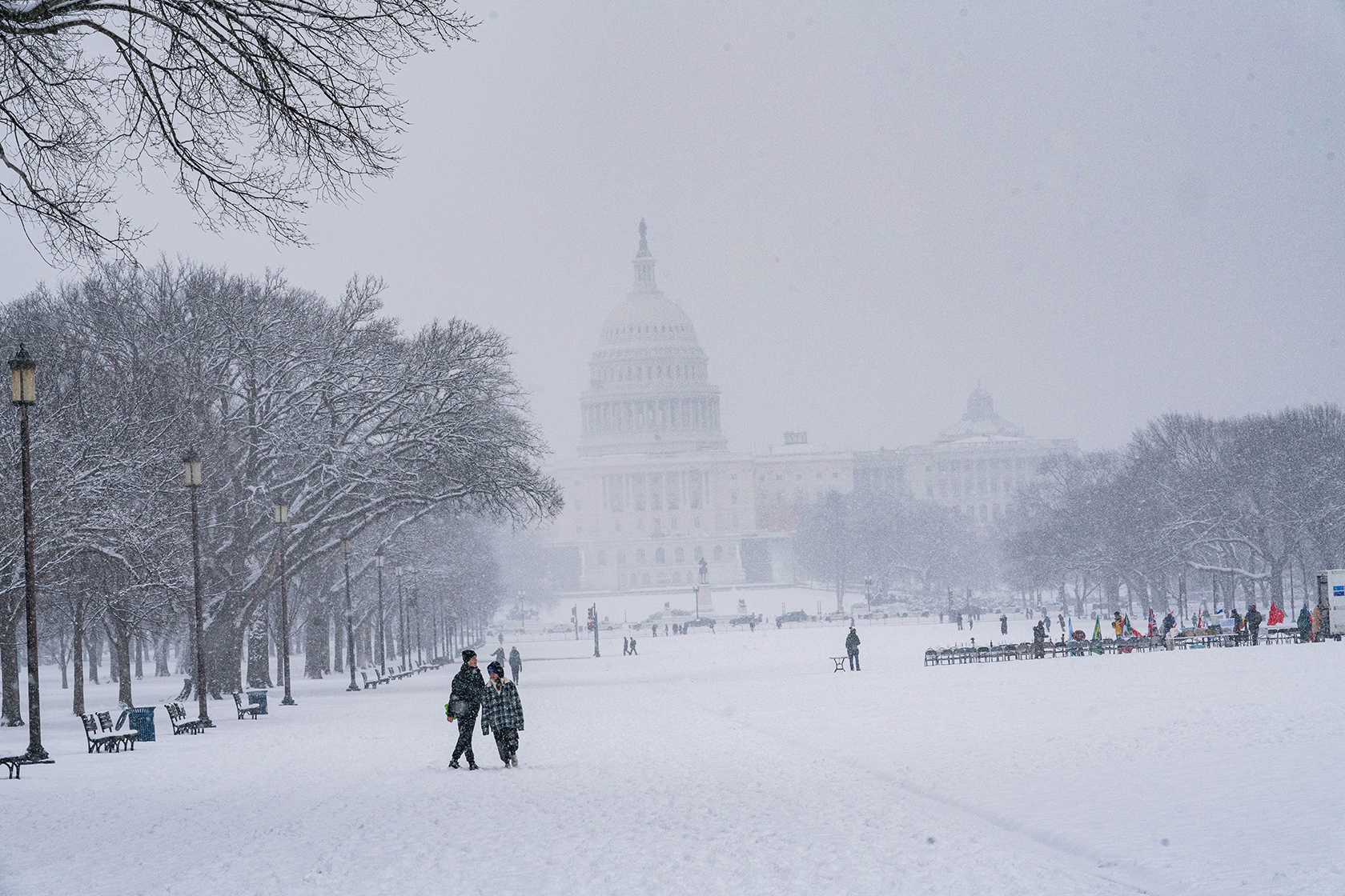 People walking in front of Capitol building