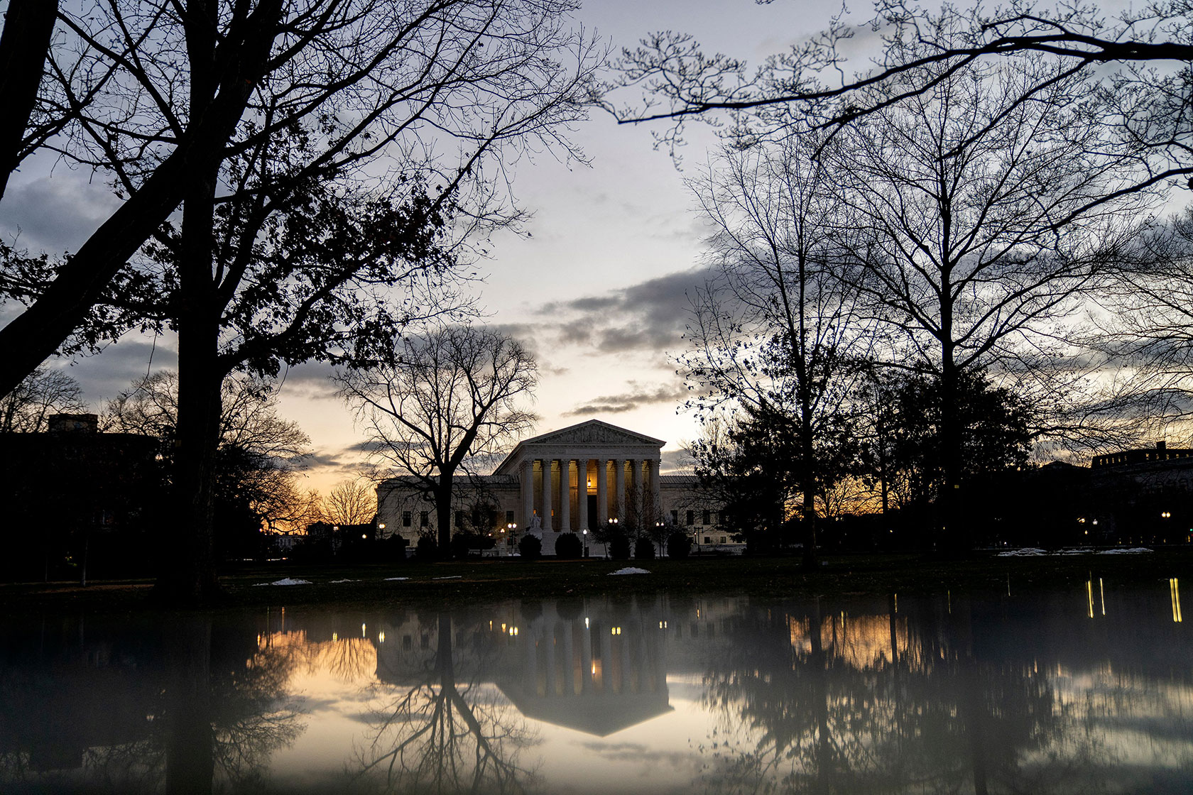 The U.S. Supreme Court is seen at dusk.