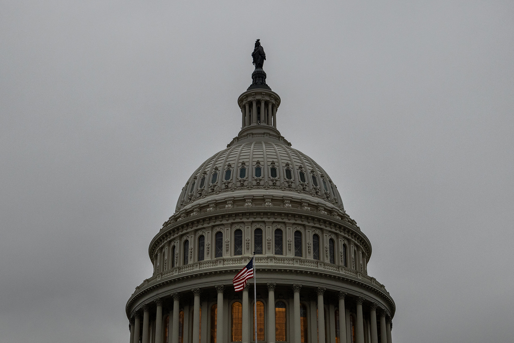 Capitol building against overcast sky