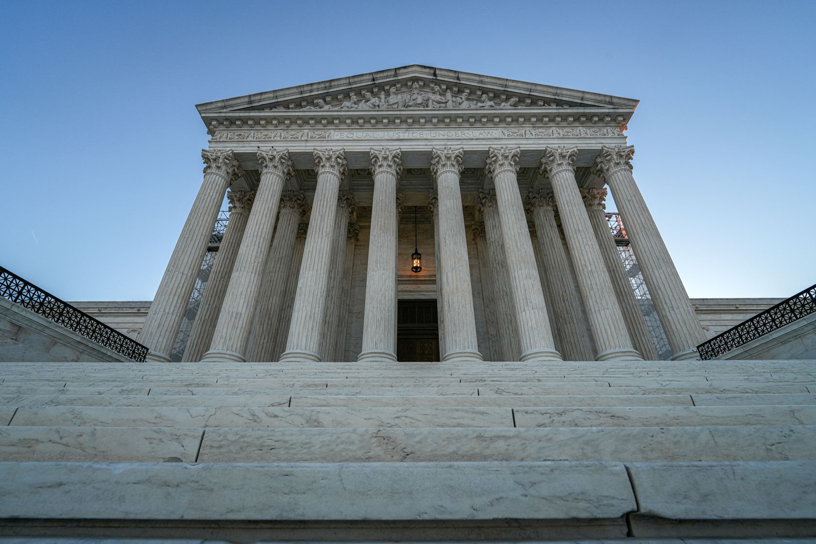 Stone steps lead up to the front of the U.S. Supreme Court building.