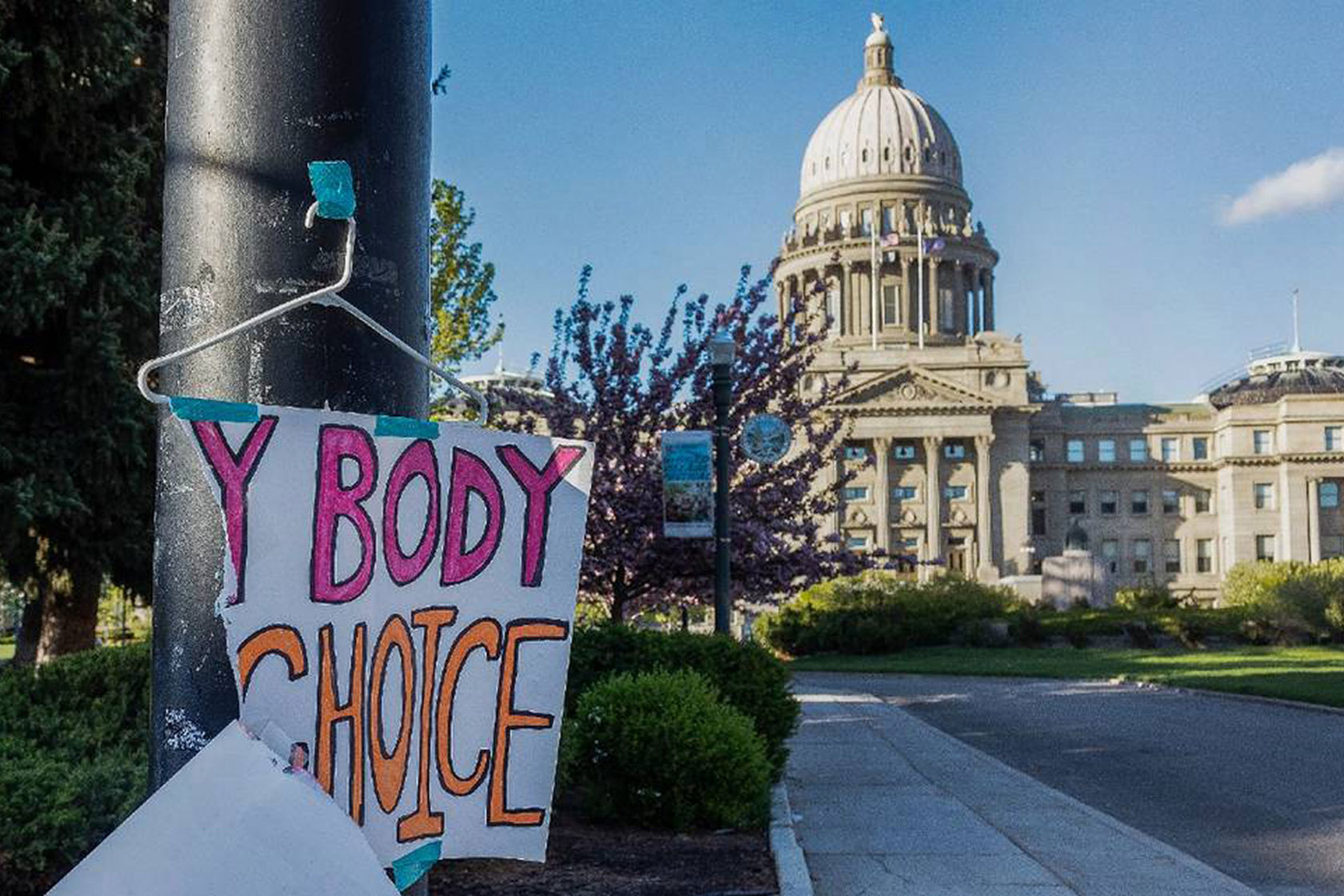 A sign hangs near the Idaho State Capitol in Boise.