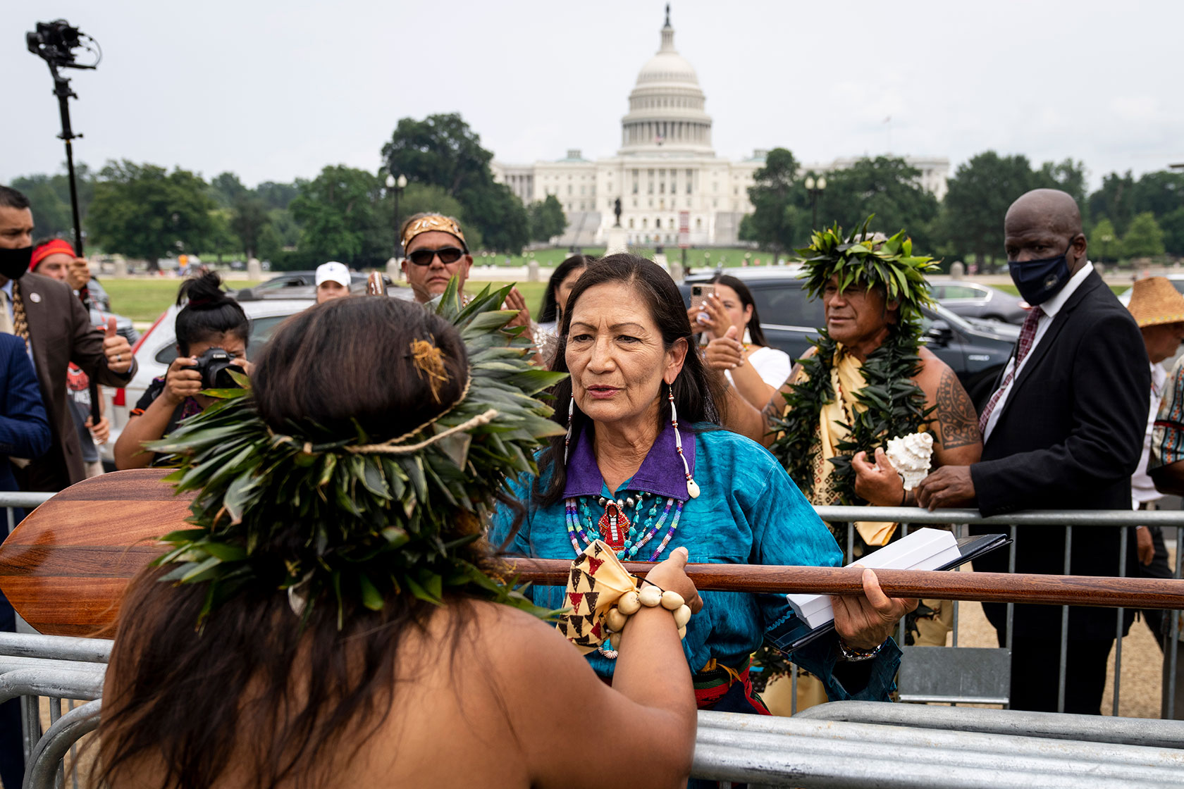 U.S. Secretary of the Interior Deb Haaland greets guests on the National Mall.