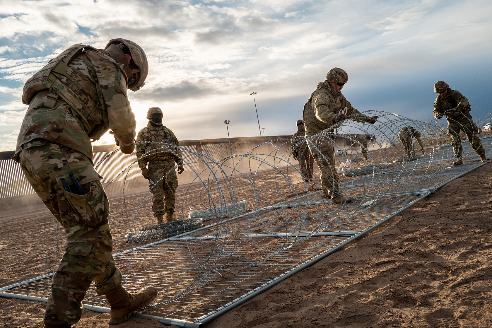 Texas National Guard soldiers install border fencing near the Rio Grande.