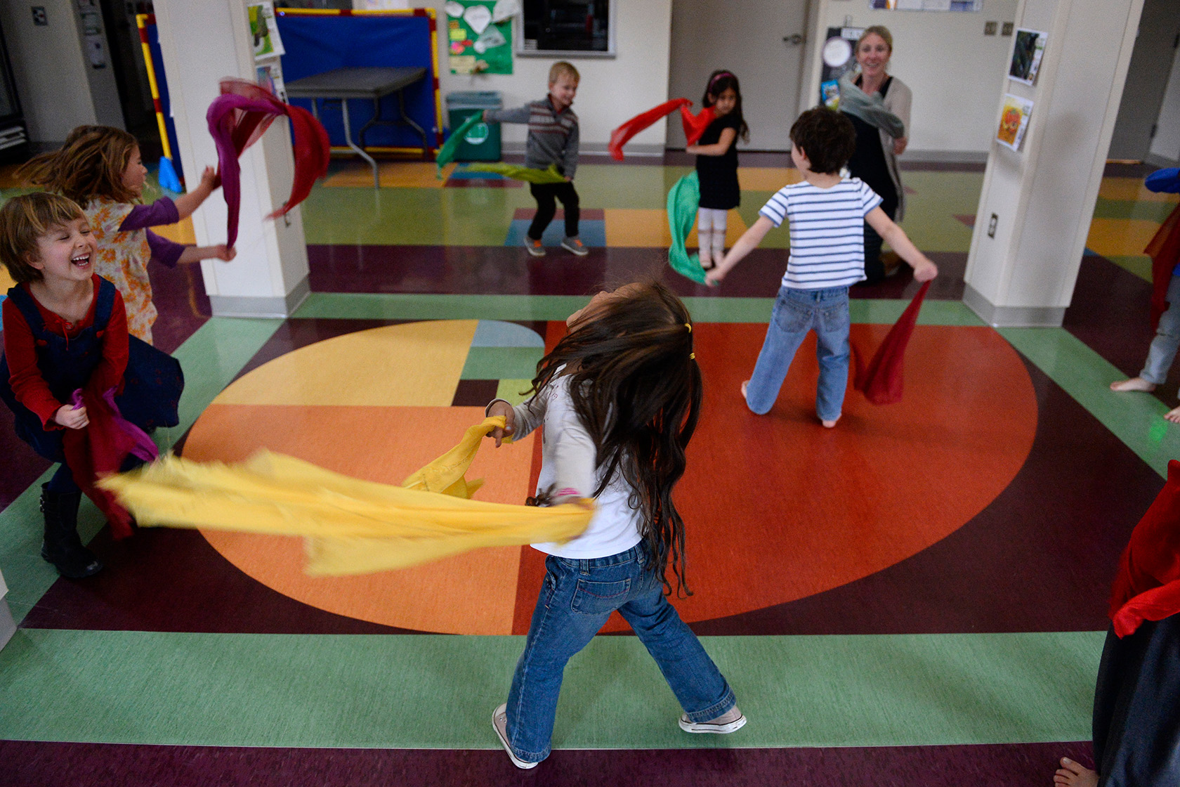 Children dance together during a “creative movement class.”