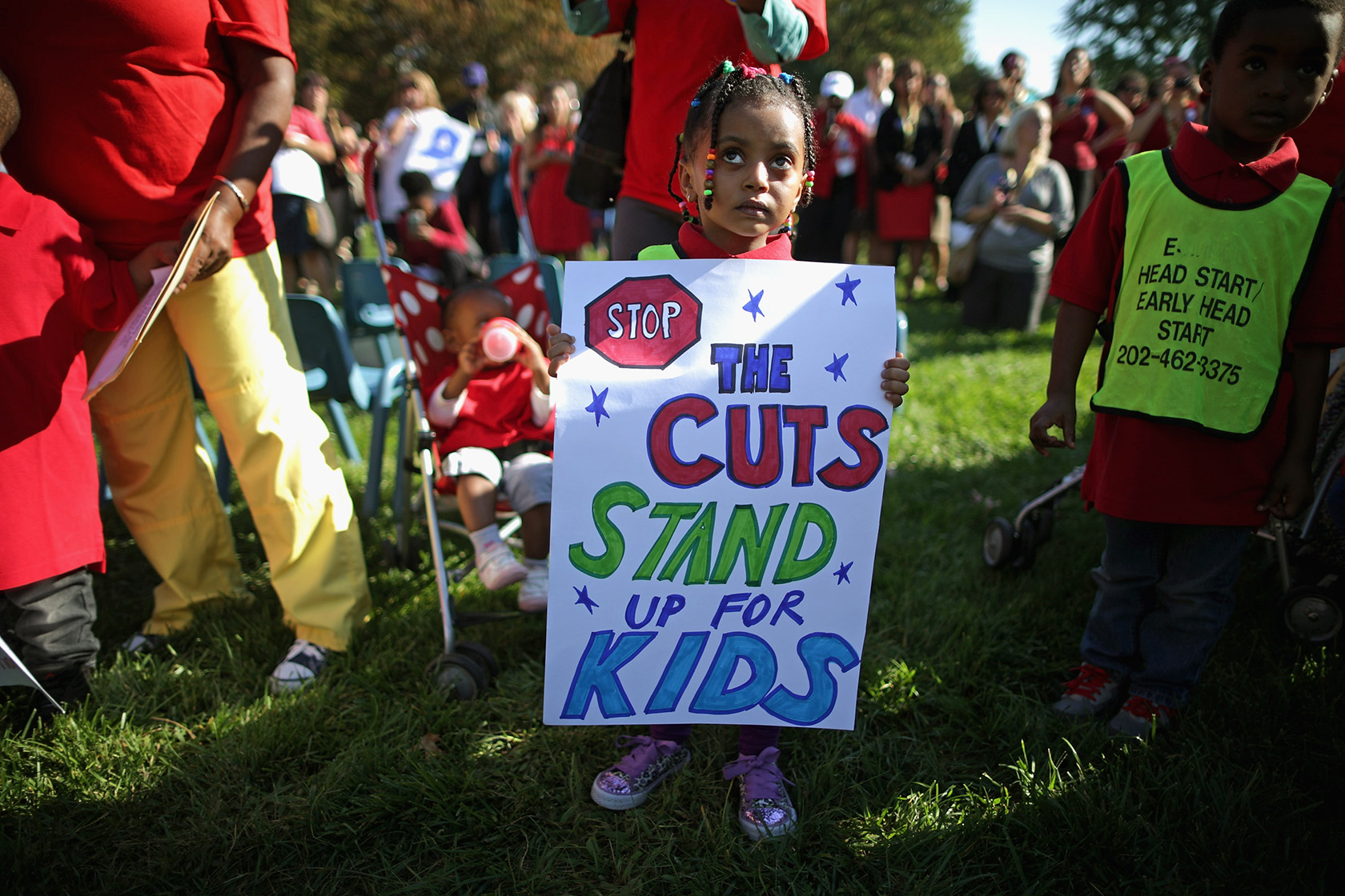Children from a Head Start program join supporters and members of Congress outside the U.S. Capitol.