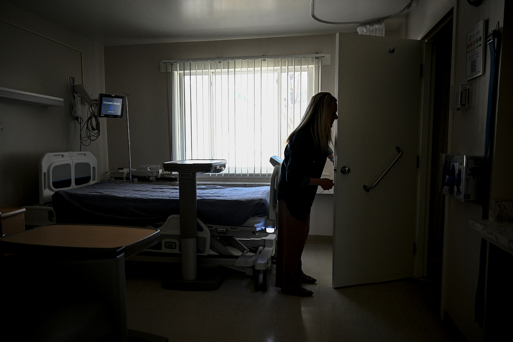 A hospital employee gives a tour of a patient room in Hugo, Colorado.