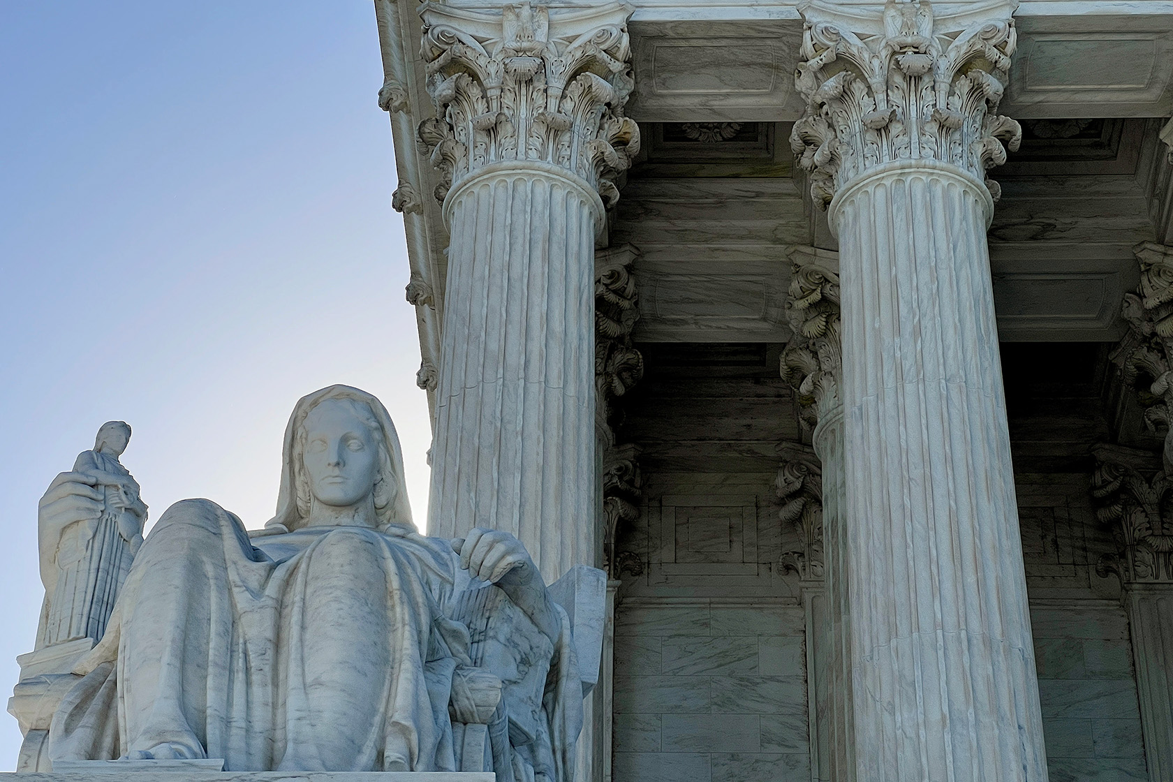 The “Contemplation of Justice“ statue sits above the west front plaza of the U.S. Supreme Court.