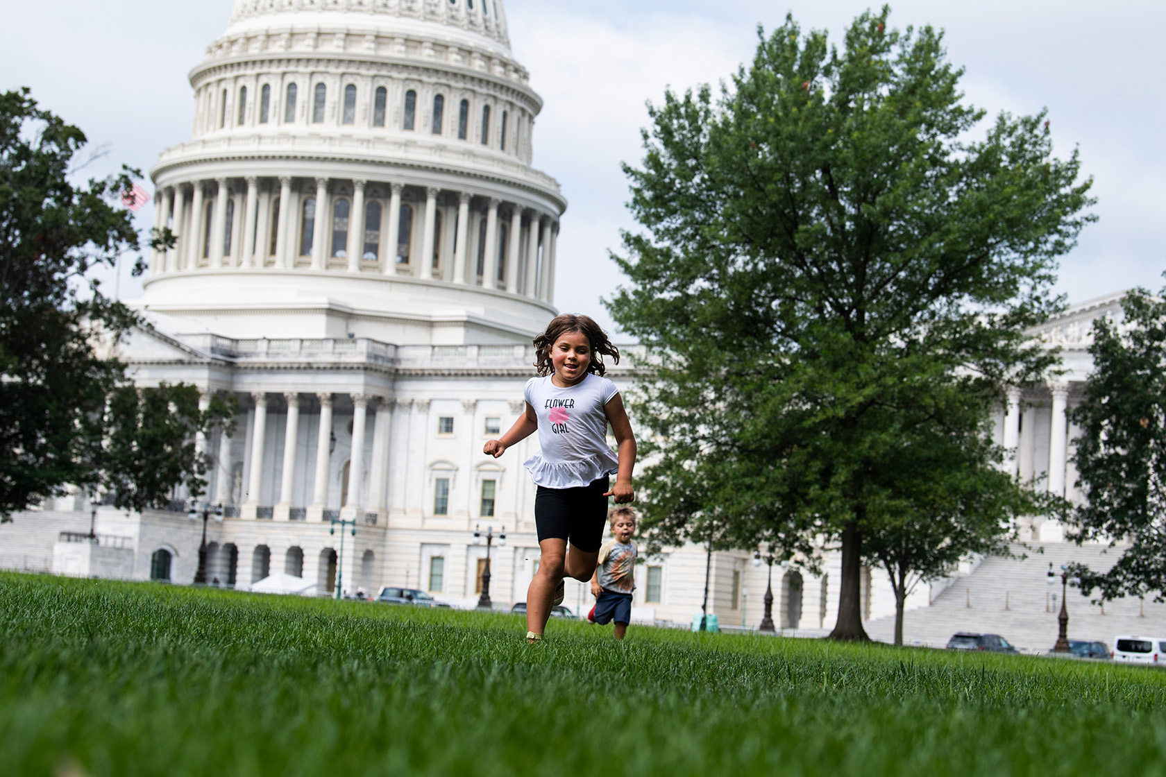 Children play on the east front lawn of the U.S. Capitol.