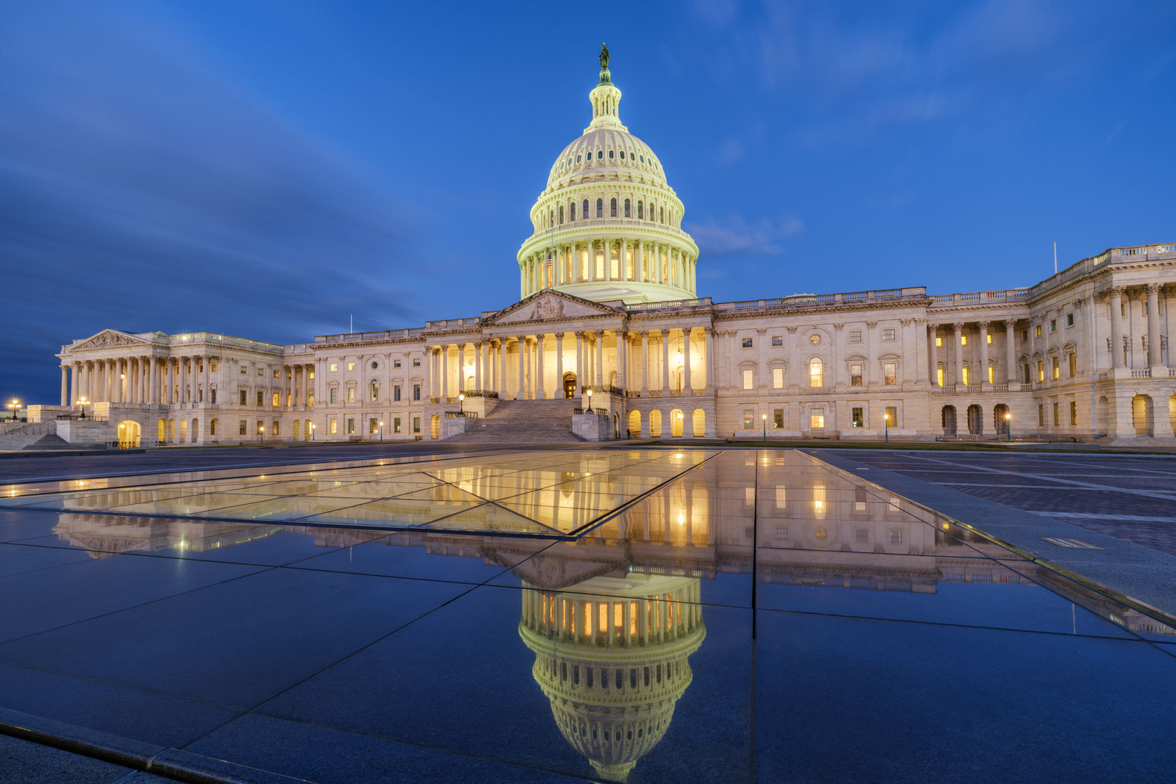 The U.S. Capitol building is seen at dusk.