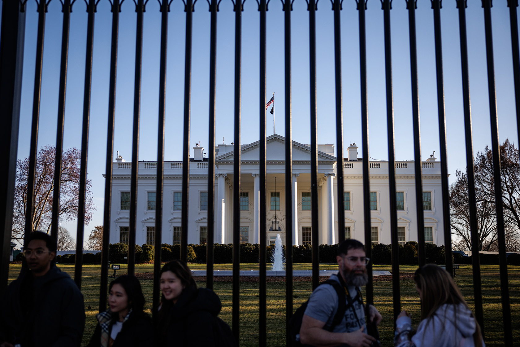 Visitors stop by the North Lawn of the White House.