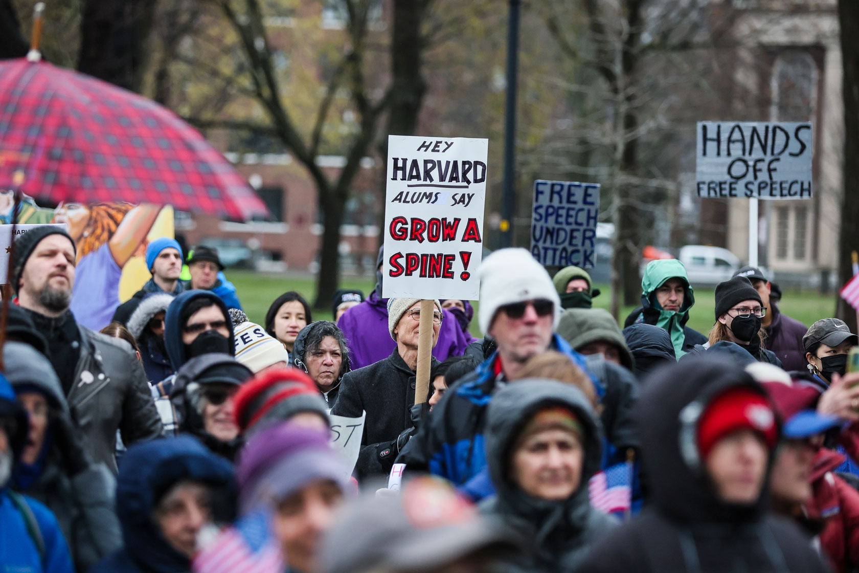 Demonstrators urge Harvard University to reject President Trump's influence on the institution.