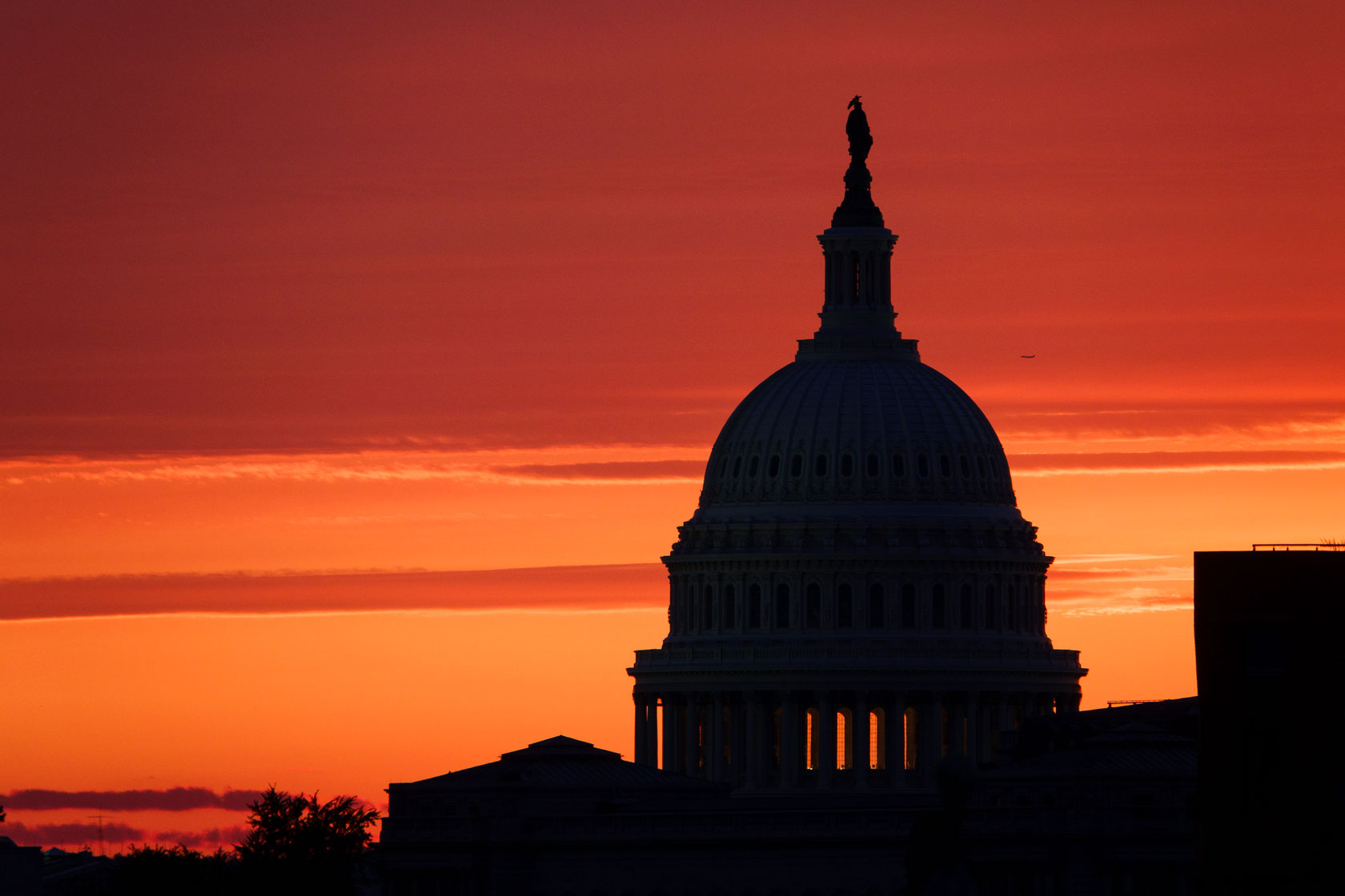 The U.S. Capitol is seen at sunset.