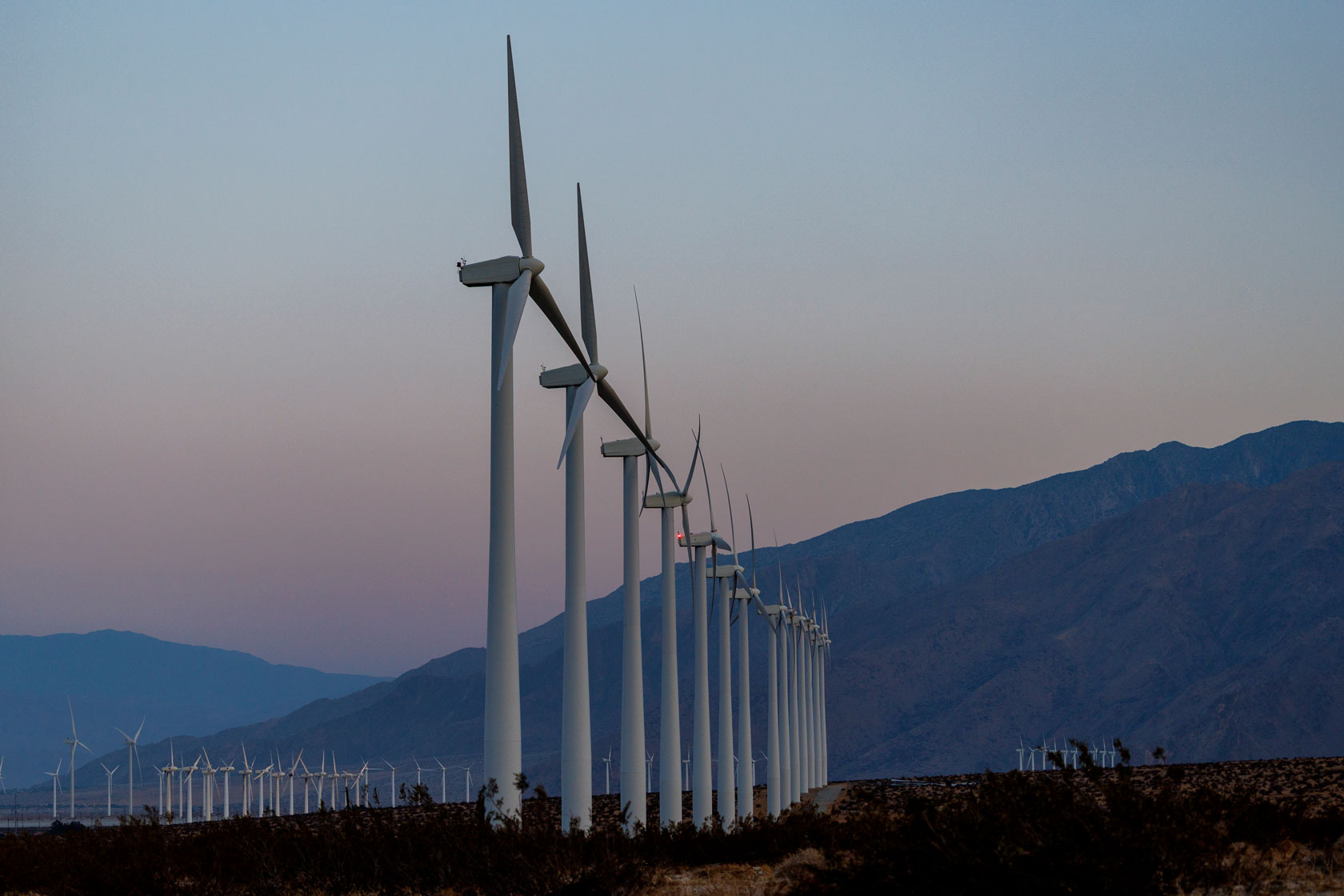 Windmills are seen off of Dillon Road in Desert Hot Springs, California.