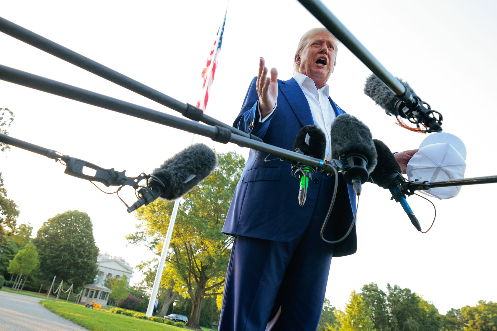President Donald Trump speaks to reporters outside the White House on June 24, 2025, Washington, D.C.