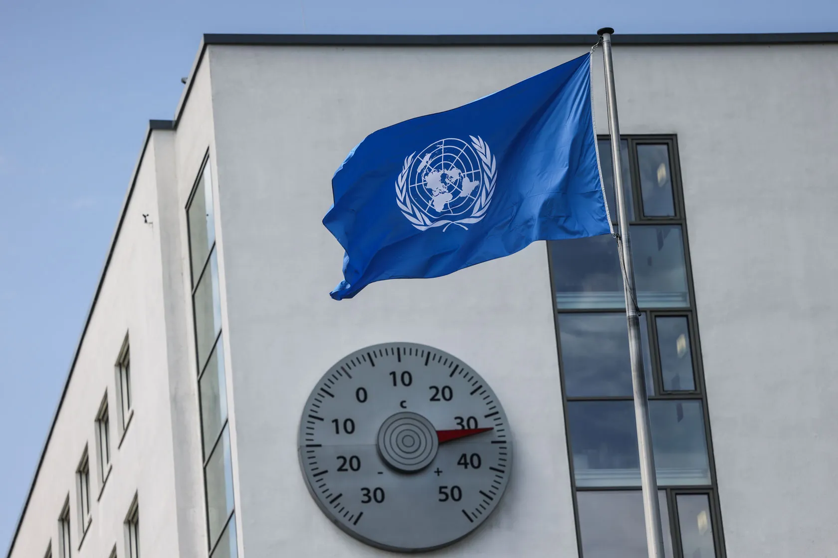 A thermometer on the United Nations Climate Change Secretariat building in North Rhine-Westphalia, Cologne, reads 32 degrees Celsius.