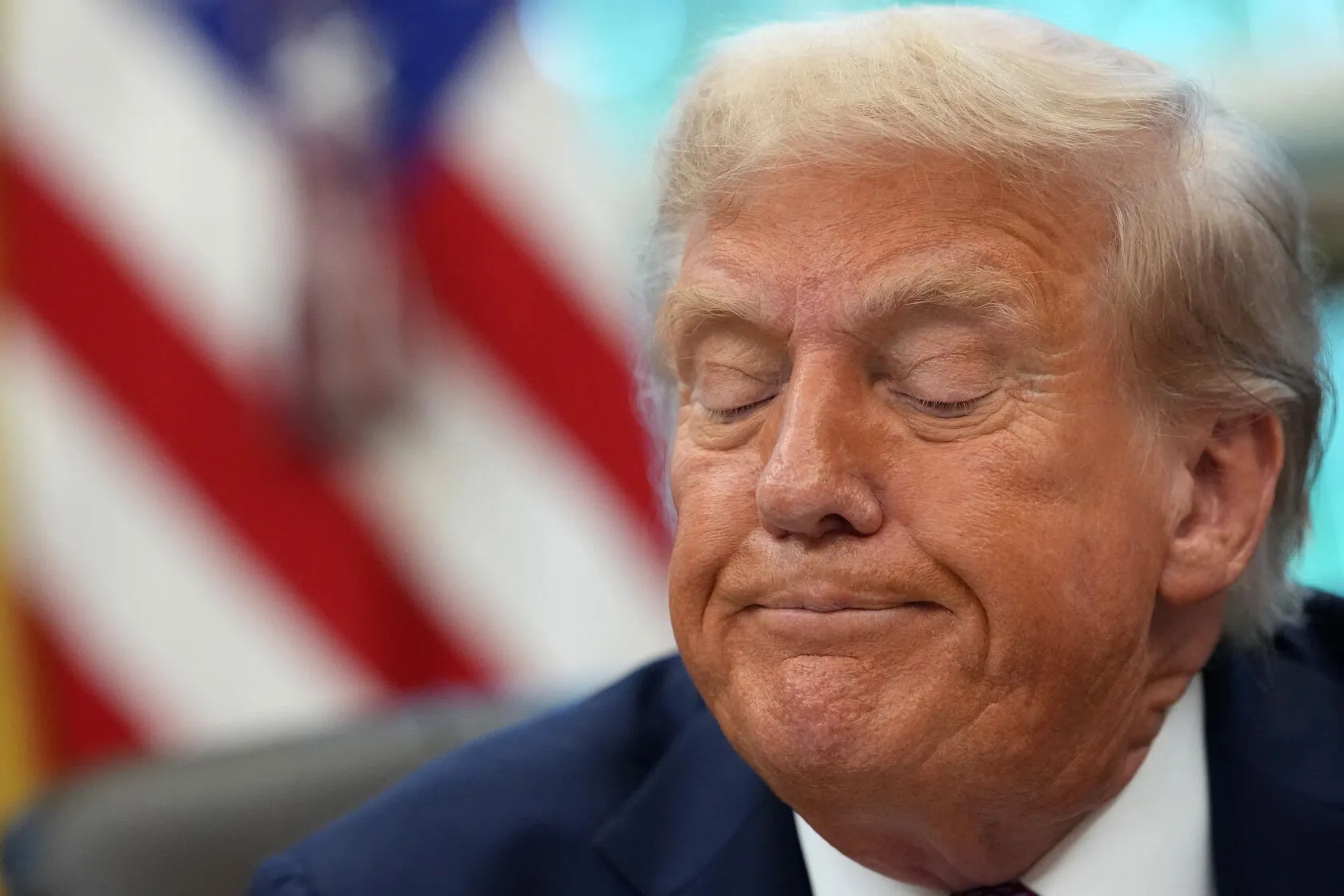 U.S. President Donald Trump speaks to members of the media.