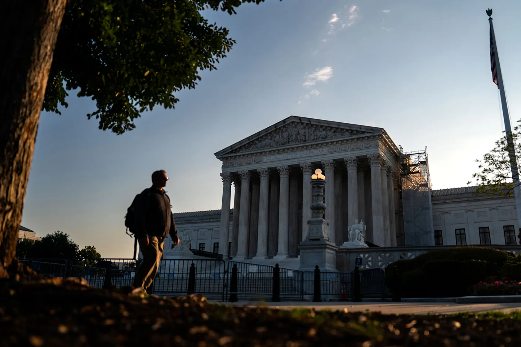 People pass outside the U.S. Supreme Court.