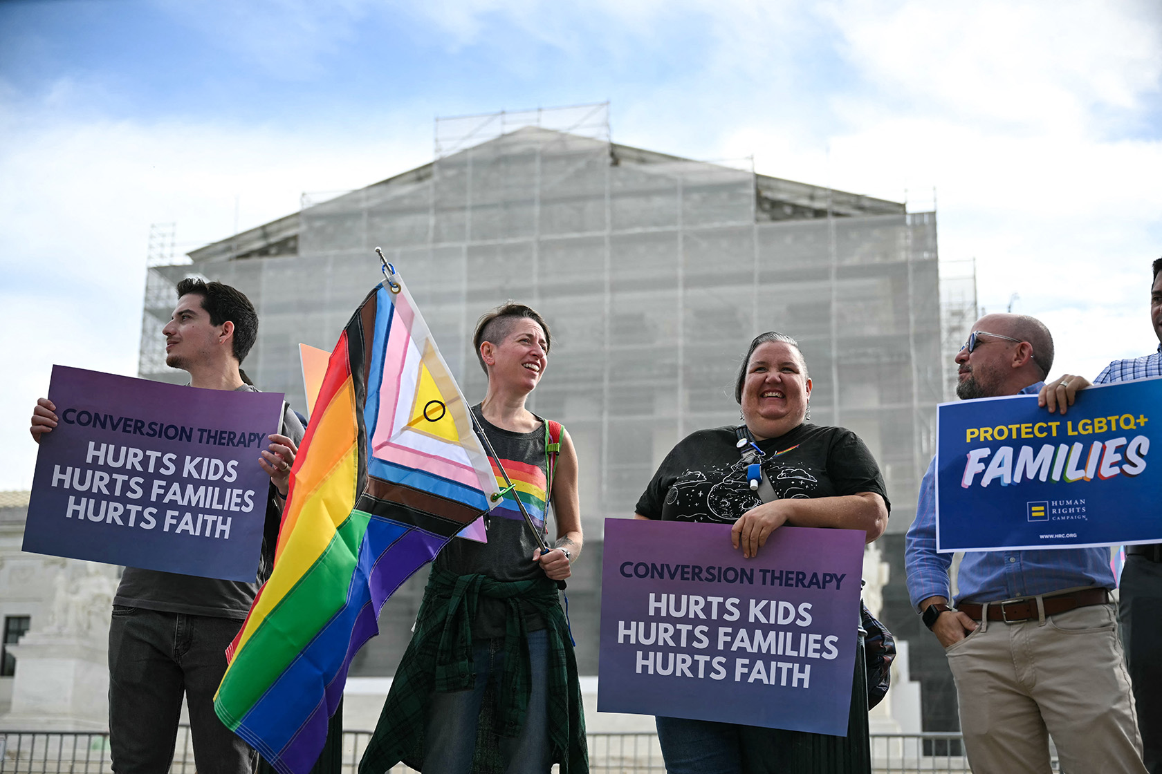 Demonstrators protest against conversion therapy outside the U.S. Supreme Court.