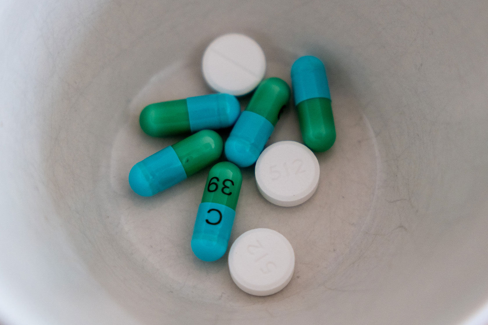 Pills in a bowl seen from above