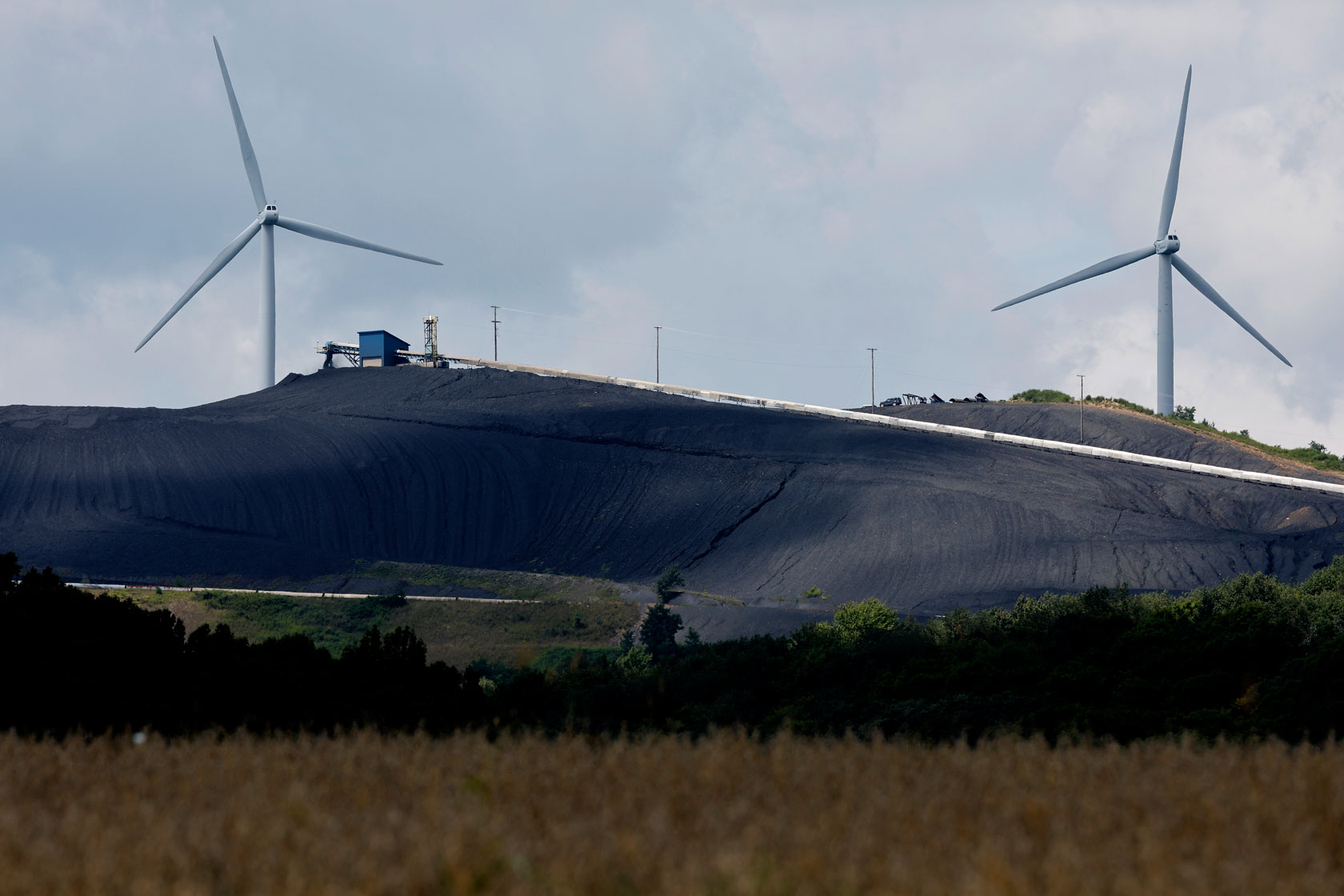 Turbines from the Roth Rock wind farm along the Backbone Mountain are seen on August 23, 2022.