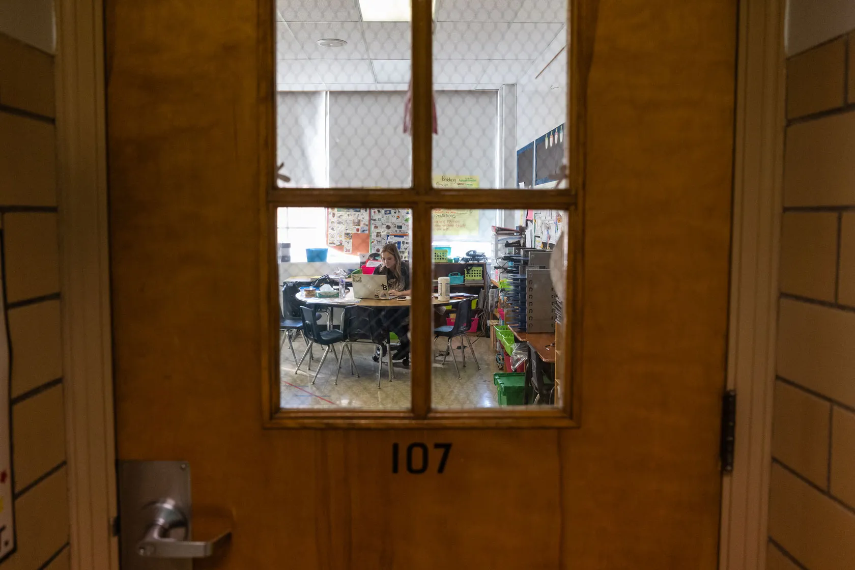 A teacher sits in a classroom in Louisville, Kentucky.