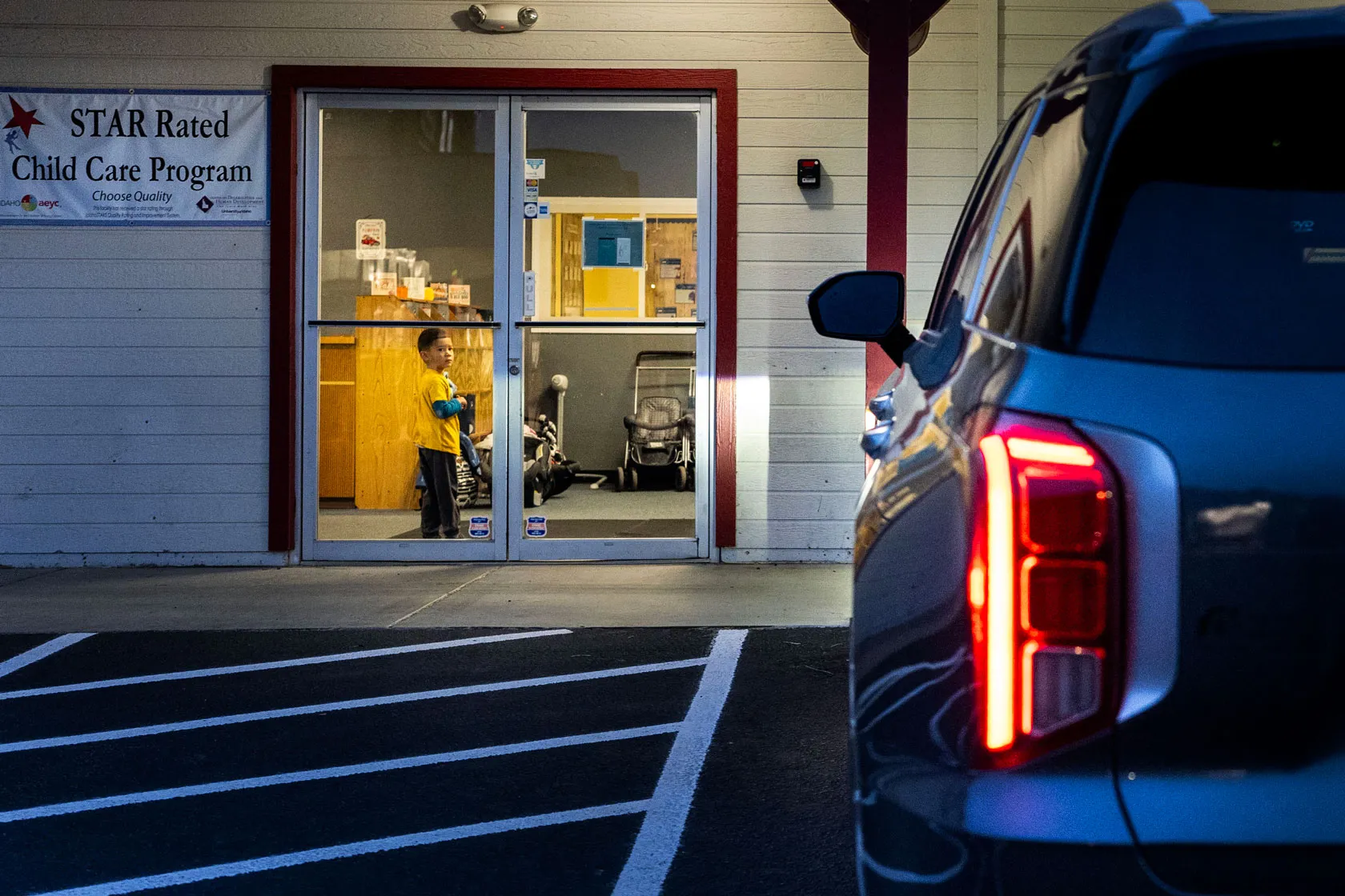 A child waits inside a daycare center in Nampa, Idaho, on November 20, 2024.
