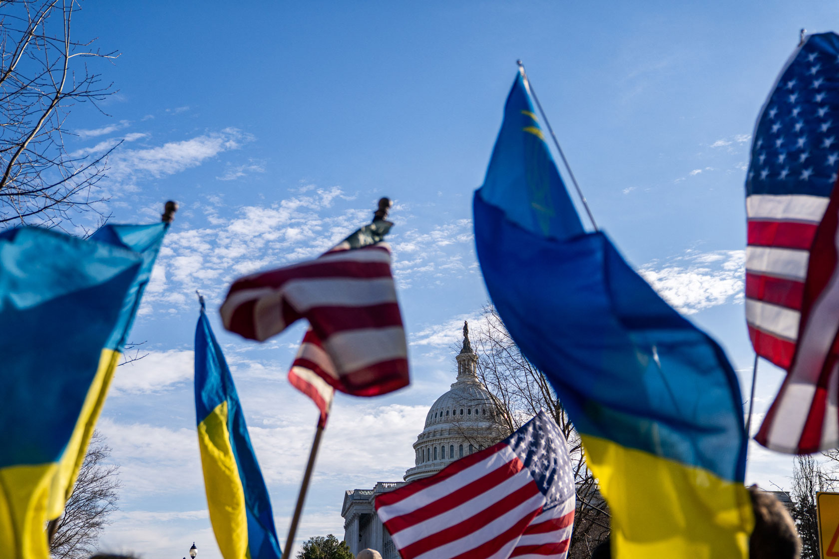 U.S. and Ukrainian flags are seen in front of the U.S. Capitol in Washington, D.C.