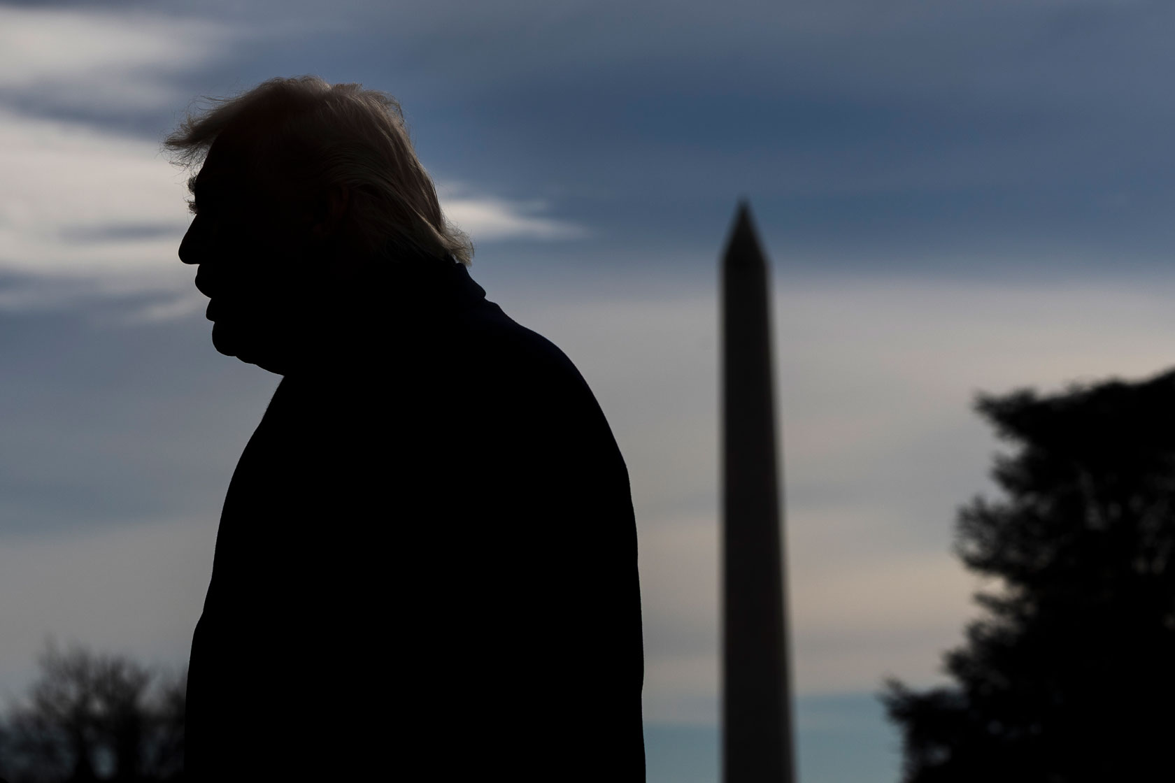 President Trump on the White House South Lawn with a view of the Washington Monument in the background.