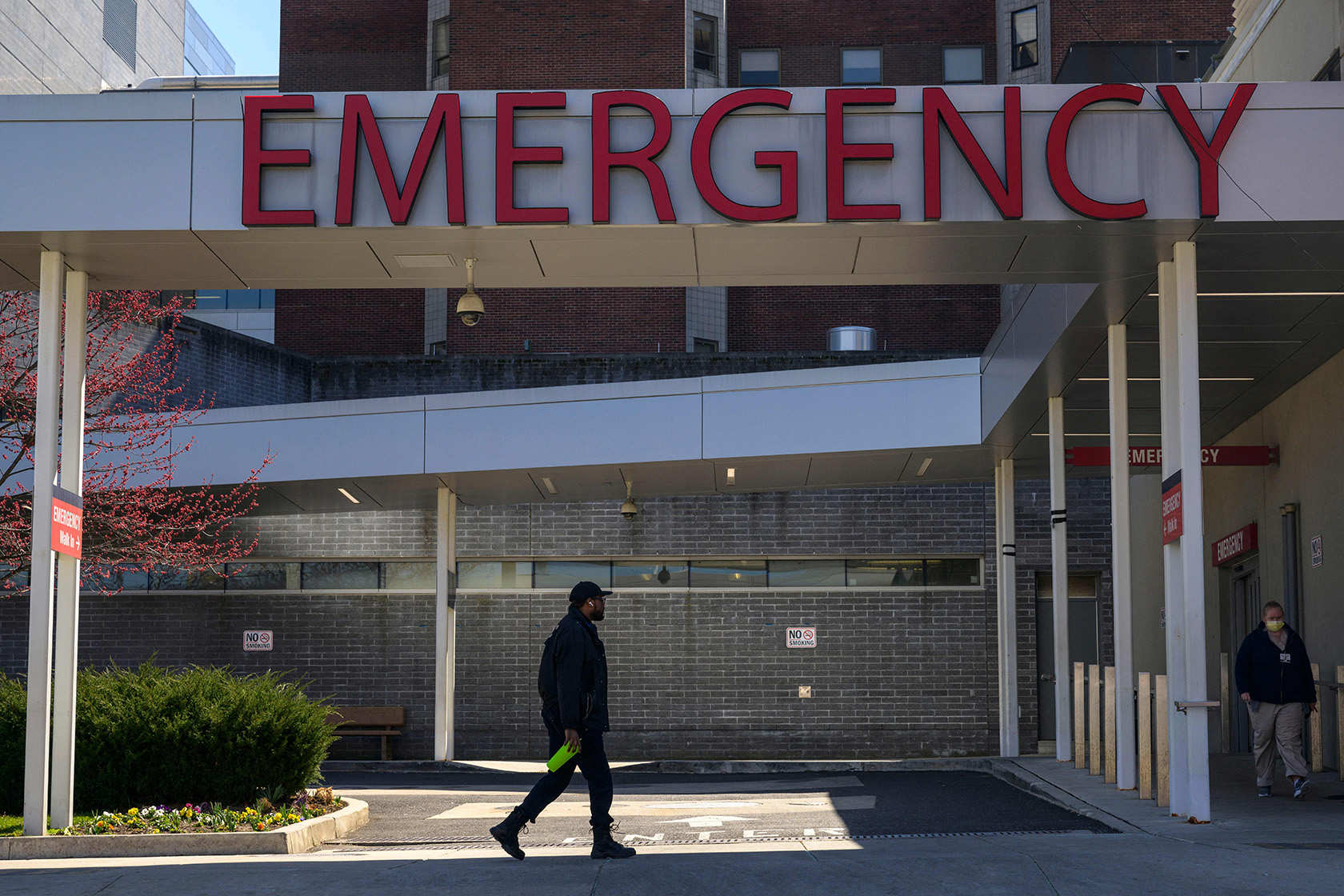 A man walks toward a Philly hospital.