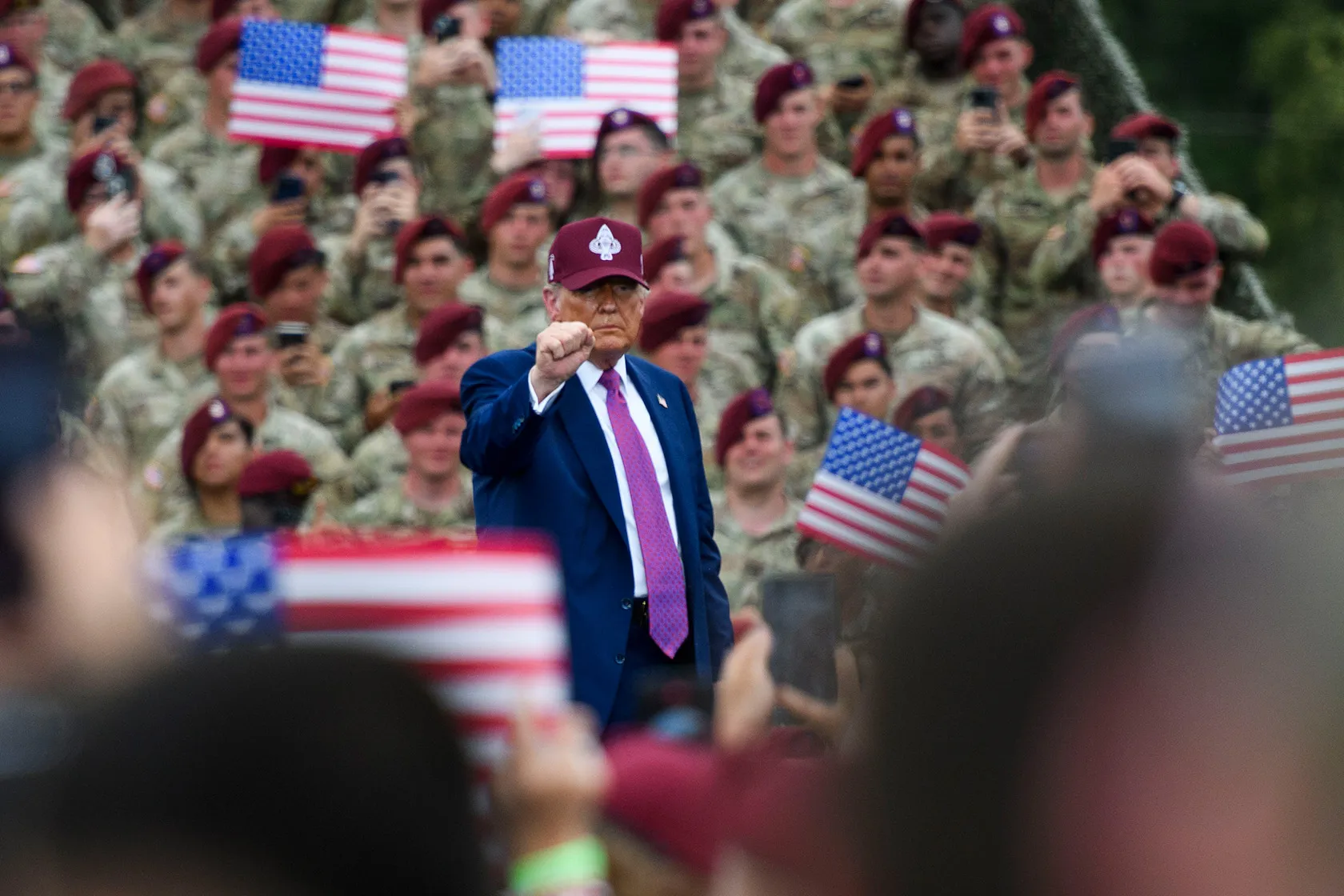 U.S. President Donald Trump pumps his fist to the crowd.