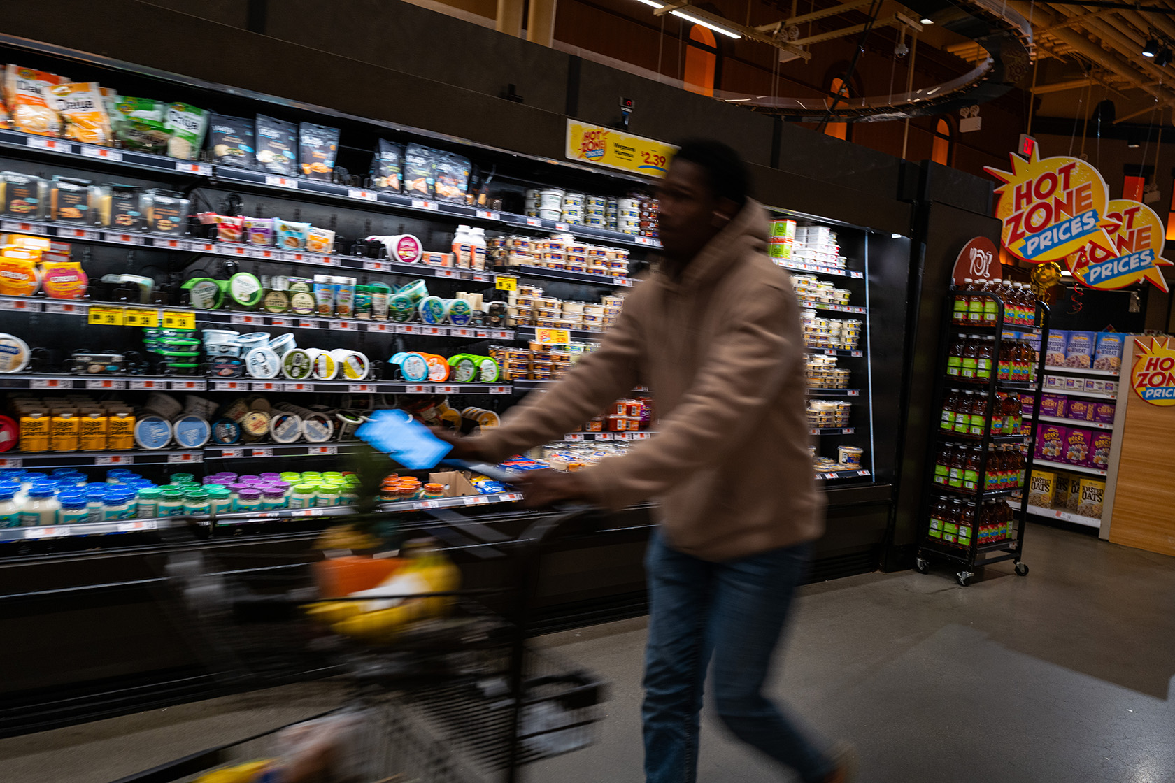 People shop at a grocery store in Brooklyn.