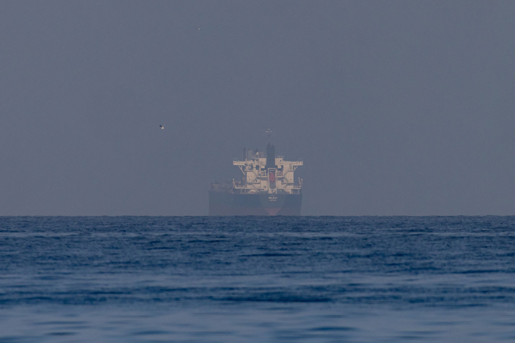 A bulk carrier is seen near the Strait of Hormuz on March 22, 2026. (Getty)