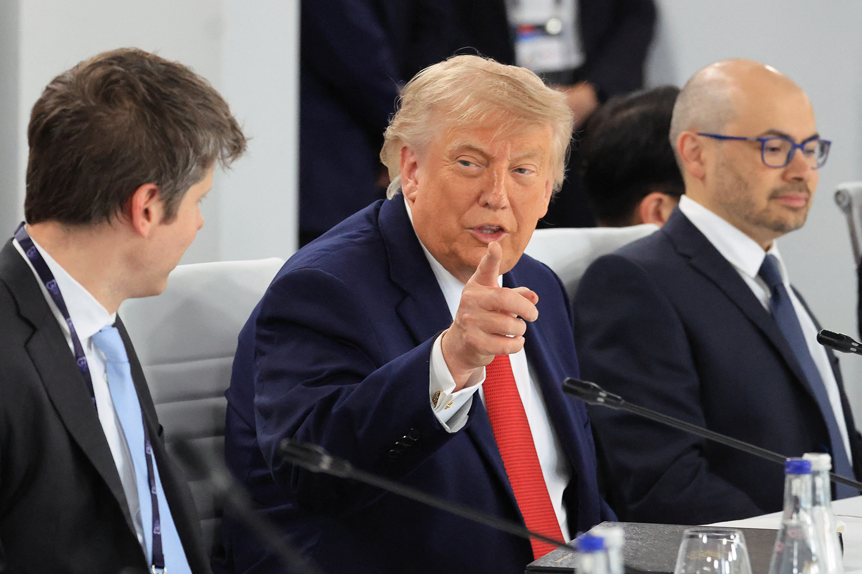 U.S. President Donald Trump speaks with Open AI CEO Sam Altman.