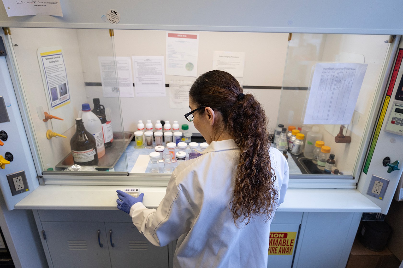 A researcher works in a kinesiology and nutrition lab.